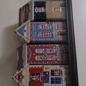 Collectible Seasonslly Decorated Cookie Tin Houses